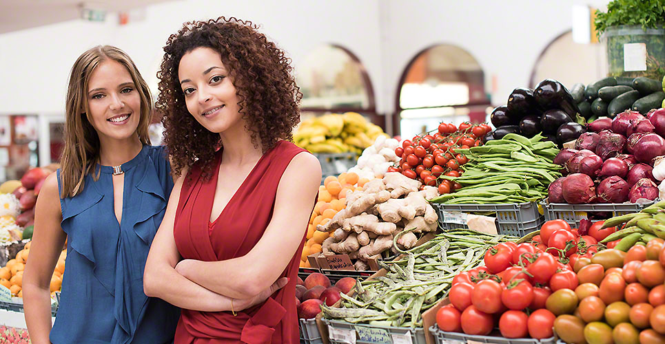 Women at greengrocer