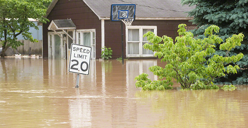 Flood waters in an Indiana town with flooded homes