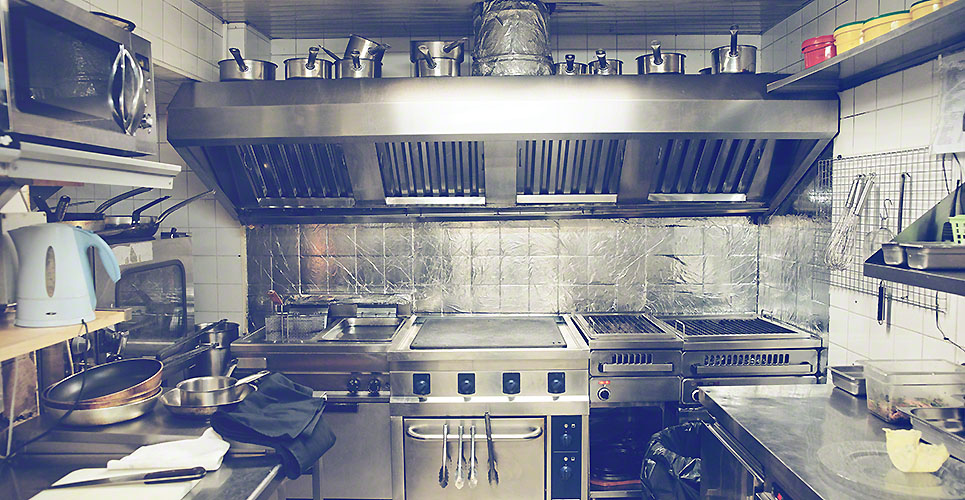 Typical kitchen of a restaurant, toned
