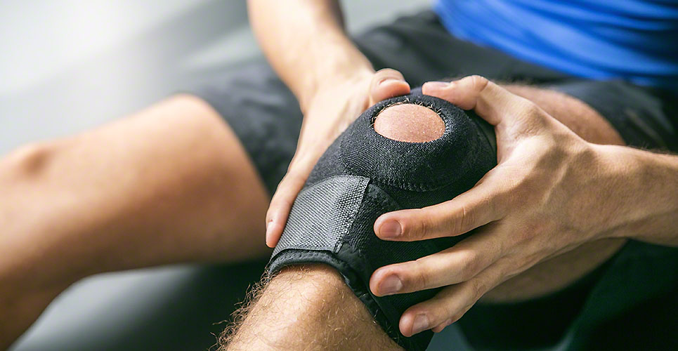 Sports injuries, bandaged knee